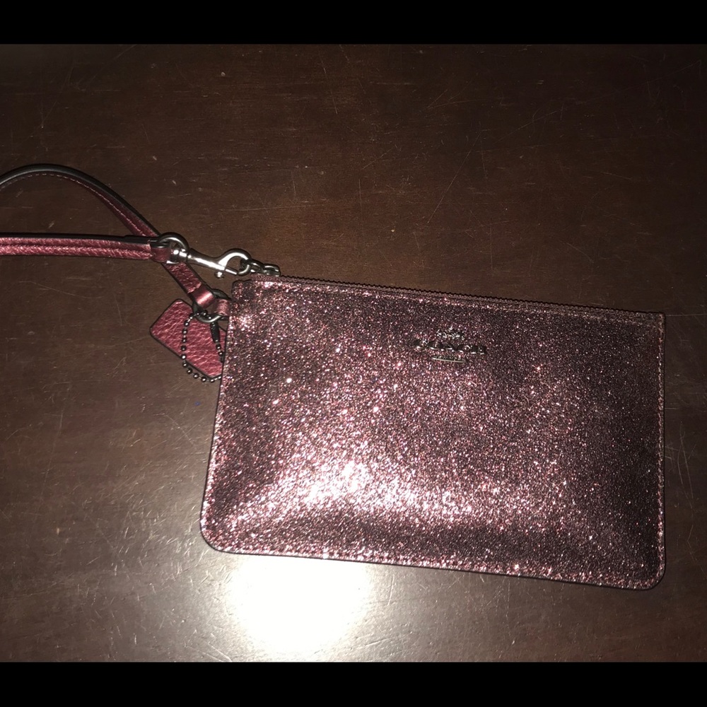 Burgundy coach wristlet